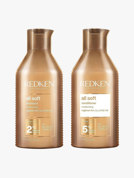 Redken All Soft Shampoo and Conditioner in branded components on a light gray background